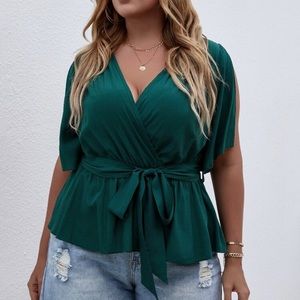 Green plunge peplum top